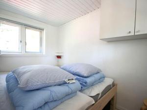 Postel nebo postele na pokoji v ubytování Holiday Home Evert - 250m from the sea by Interhome + 9 fotografií