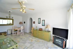 A television and/or entertainment centre at Stunning Views Mirador de Mijas Apt