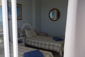 A bed or beds in a room at Stunning Views Mirador de Mijas Apt
