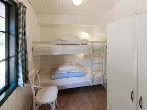 Postel nebo postele na pokoji v ubytování Holiday Home Jale - 50m from the sea by Interhome