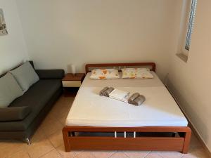 Posteľ alebo postele v izbe v ubytovaní Mario Apartment