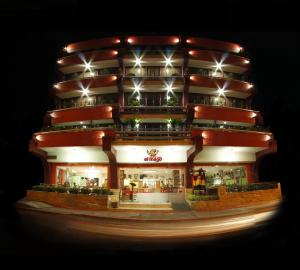 a large building with lights on top of it at Hotel Las Américas in Morelia