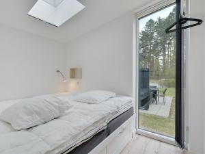 Postel nebo postele na pokoji v ubytování Apartment Serafina - 200m from the sea in Lolland- Falster and Mon by Interhome
