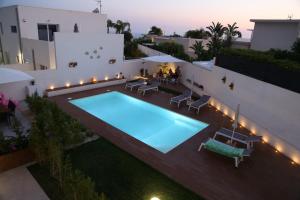 Swimmingpoolen hos eller tæt på VILLA HERAIA