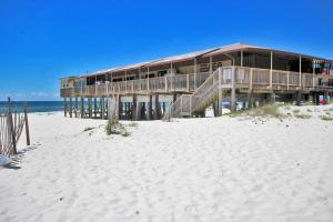 a building on the beach next to the ocean at Boardwalk 685 in Gulf Shores