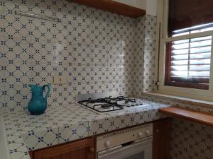 A kitchen or kitchenette at SanvitoTour - Le Terrazze