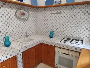 A kitchen or kitchenette at SanvitoTour - Le Terrazze