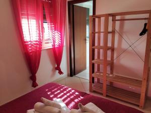 A bed or beds in a room at SanvitoTour - Le Terrazze