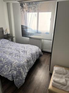 Posteľ alebo postele v izbe v ubytovaní Tres Cruces Apartment
