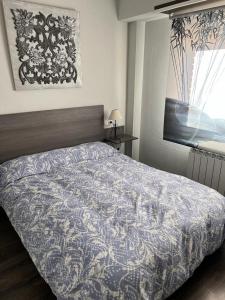 Posteľ alebo postele v izbe v ubytovaní Tres Cruces Apartment