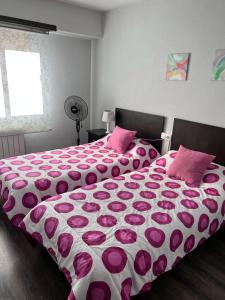 Posteľ alebo postele v izbe v ubytovaní Tres Cruces Apartment