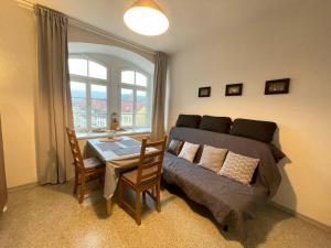 Postel nebo postele na pokoji v ubytování Bergblick Apartment Sächsische Schweiz