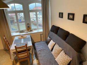 Posezení v ubytování Bergblick Apartment Sächsische Schweiz + 37 fotografií