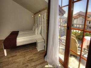 Een bed of bedden in een kamer bij Hotel-Restaurant Kriva Ćuprija