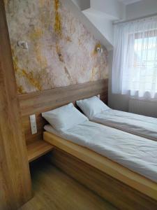 Posteľ alebo postele v izbe v ubytovaní Gal Apart