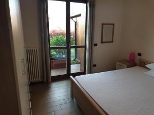 Postel nebo postele na pokoji v ubytování CASA VACANZE DA RIKI + 23 fotografií