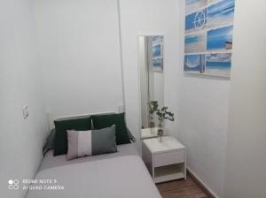 Postel nebo postele na pokoji v ubytování Apartamento playa + 37 fotografií