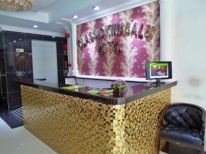 The lobby or reception area at Classic Kinabalu Hotel