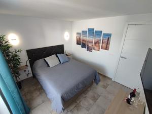 a bedroom with a bed in a room at Casa Leya Los Cristianos in Arona