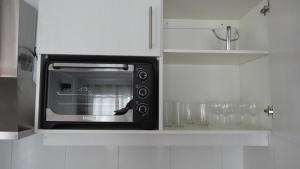 Kuchyň nebo kuchyňský kout v ubytování Condominio Los Miradores + 23 fotografií