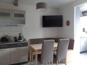 Η κουζίνα ή μικρή κουζίνα στο Appartement SAINT CYPRIEN PLAGE 6 Couchages