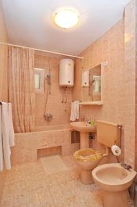 Koupelna v ubytování Apartment Steli + 35 fotografií