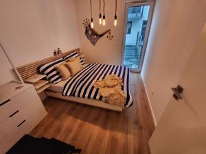 Posteľ alebo postele v izbe v ubytovaní Mickey Apartment Old Town