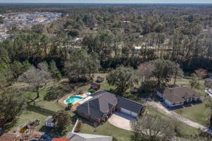 an aerial view of a house with a swimming pool at Sunset Pass in Middleburg