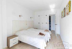 Katil atau katil-katil dalam bilik di Inftour Paola 5 Apartamento