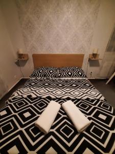 Postel nebo postele na pokoji v ubytování Hotel Boršičanka