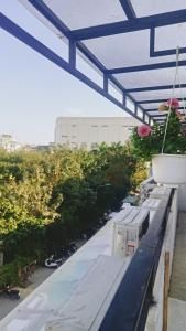 Balkón nebo terasa v ubytování LaLa Homestay + 26 fotografií