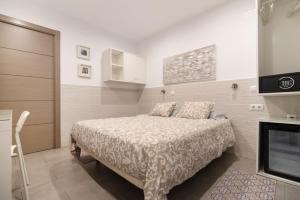 Posteľ alebo postele v izbe v ubytovaní Hostal House