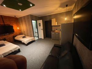 Posteľ alebo postele v izbe v ubytovaní Apartamenty Konopnicka