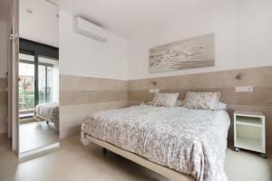 Posteľ alebo postele v izbe v ubytovaní Hostal House