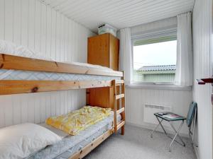 Postel nebo postele na pokoji v ubytování Holiday Home Siv - from the sea by Interhome