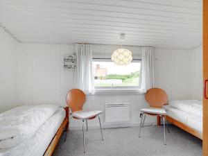 Postel nebo postele na pokoji v ubytování Holiday Home Siv - from the sea by Interhome