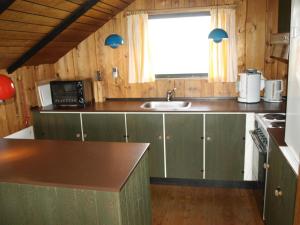 Kuchyň nebo kuchyňský kout v ubytování Holiday Home Elsine - 800m from the sea by Interhome + 6 fotografií
