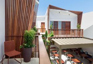 Een balkon of terras bij Villa Nautica Boutique Hotel