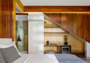 Een bed of bedden in een kamer bij Villa Nautica Boutique Hotel