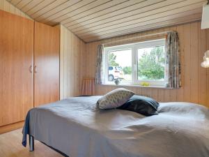 Postel nebo postele na pokoji v ubytování Holiday Home Ivar - 900m from the sea by Interhome