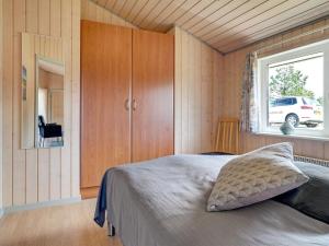 Postel nebo postele na pokoji v ubytování Holiday Home Ivar - 900m from the sea by Interhome