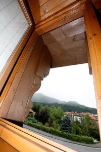 a view through a window of a house at Imperion in Cangas de Onís