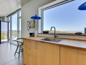 Kuchyň nebo kuchyňský kout v ubytování Holiday Home Ginne - 125m from the sea by Interhome + 30 fotografií