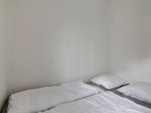 Postel nebo postele na pokoji v ubytování Apartment Alimpij - 150m from the sea by Interhome + 21 fotografií