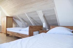 Postel nebo postele na pokoji v ubytování Reiterhof Gründeich