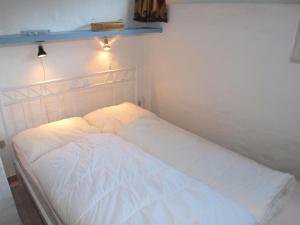 Postel nebo postele na pokoji v ubytování Apartment Emiliana - 500m from the sea in NW Jutland by Interhome