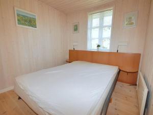 Postel nebo postele na pokoji v ubytování Holiday Home Tomke - 1-7km from the sea by Interhome