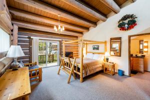 a bedroom with a bed and a wooden ceiling at Temptation 8 condo in Park City