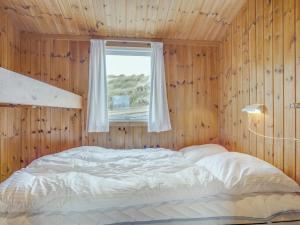Postel nebo postele na pokoji v ubytování Holiday Home Mylius - 100m from the sea by Interhome