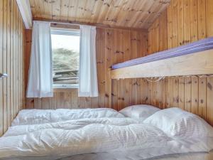 Postel nebo postele na pokoji v ubytování Holiday Home Mylius - 100m from the sea by Interhome